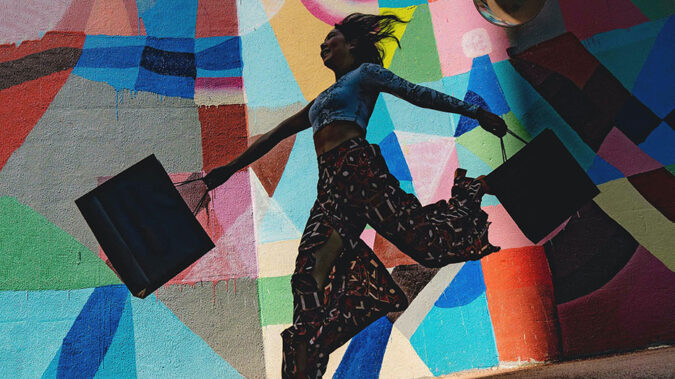 Businessman push web button Shopping Cart symbol