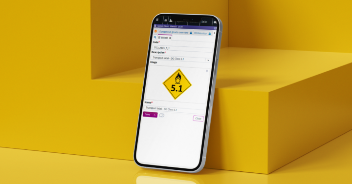 iphone on a bright yellow backround showing wms software on the screen